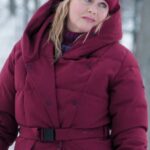 A Merry Little Ex-Mas Alicia Silverstone Maroon Puffer Coat